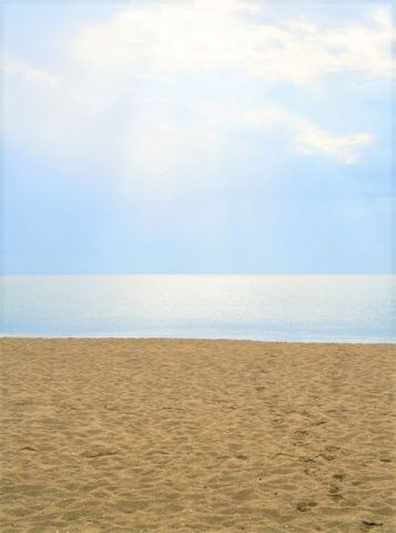 Deniz gökyüzü ve kumsal
